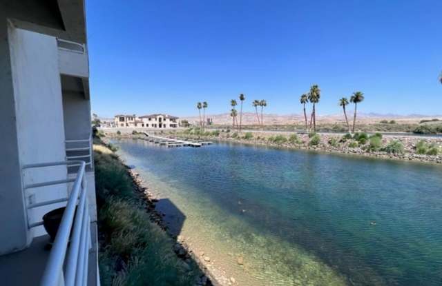 Riverfront 2BR 2BA Furnished Condo on GROUND LEVEL W/Garage and UTILITIES Included AVAIL 4/1/26 photos photos