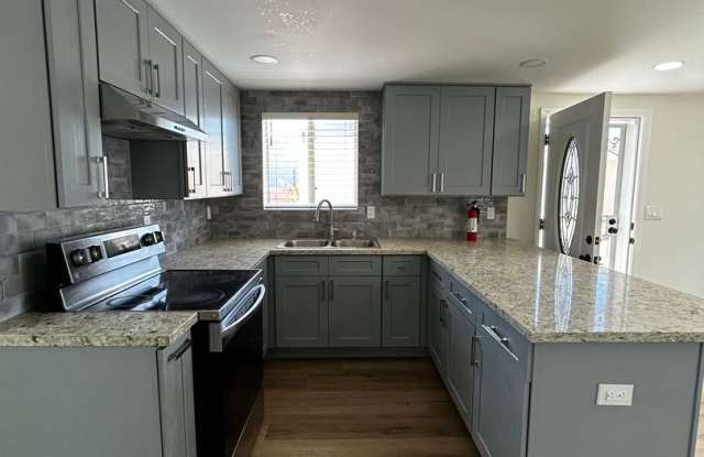 AVAILABLE NOW - RECENTLY REMODELED 3BD+1BA HOME with Modern Finishes Gallery 1