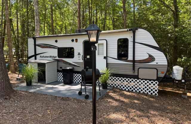 30 Ft. new travel trailer in Quiet Park Like setting photos photos