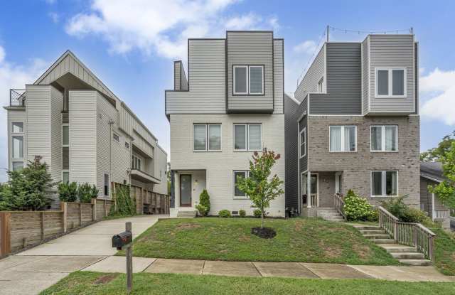 Stunning 4-bedroom, 3.5-bath contemporary home in the highly sought-after Nations neighborhood! Gallery 1