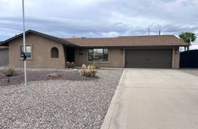 2 Bedrooms | 2 Full Bathrooms | Approx. 1,150 Sq. Ft. | Boat-Deep A/C Garage | RV/Boat Parking + Side-Gate Access Gallery 1