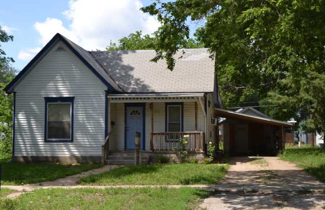Nice and previously remodeled 2 bedroom w/ detached 3rd bedroom, carport & storage garage in Clay Center, KS photos photos