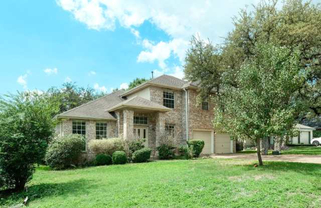 Nice executive 4/3.5/2 home on large corner tree shaded lot! photos photos