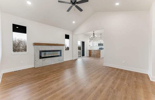 Single family home in Goddard Kansas. This home features 2 bedrooms, 2 bathrooms and a three car garage. Gallery 4