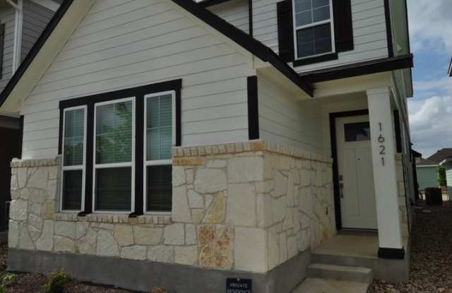 Enjoy a lock and leave lifestyle in this brand new cottage style home at The Retreat at Hero Way - 1621 Bella Drive, Leander, TX 78641