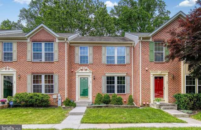 Welcome to this beautiful 3bd 2.5bth brick-front townhome in the highly desirable New Town community photos photos