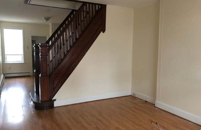 Great Home! Wood Flooring! Updated Kitchen! Wood Cabinets! Granite Counters! Great Living Space! W/D Hook-ups! Lots of Storage! Gallery 3