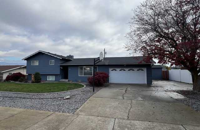 SPACIOUS 4 bed/2 bath home in desired location with double garage, fenced back yard! photos photos