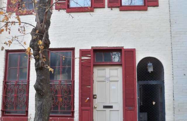 Charming Seton Hill 2bd/1ba Plus Den Rowhome w/ W/D  CAC--Available 9/14 - 418 George Street, Baltimore, MD 21201