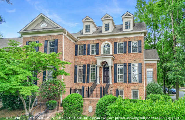 Luxurious 4 Bedroom, 5.5 Bathroom Townhome on Prestigious Queens Road. Contact (980) 315-3645 for private showing. photos photos