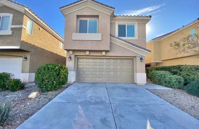 STUNNING 2 STORY HOME IN A GUARD GATED COMMUNITY! LOCATED IN RHODES RANCH GOLF COURSE! 4 BEDROOM AND 3 FULL BATH READY FOR MOVE IN! photos photos