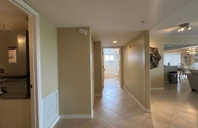 Spacious 5th-Floor Condo | Fully Furnished & Move-In Ready| indooor parking garage space Gallery 4