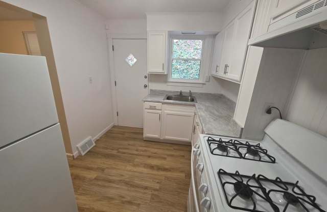 Freshly renovated townhome with modern updates and plenty of charm! Gallery 3