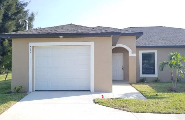3 Bedroom 2 Bath 1 Car Garage Waterfront Duplex in Cape Coral! - 612 Southwest 8th Place, Cape Coral, FL 33991