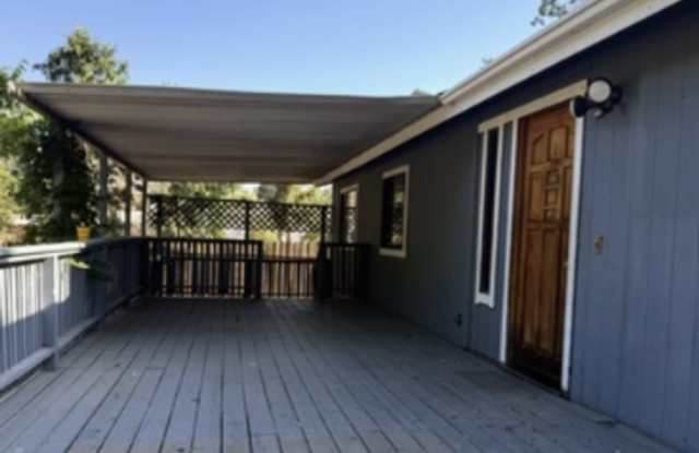 Charming 2BR/2BA Country Home with Bonus Room, Expansive Yard, & Large Decks Gallery 4