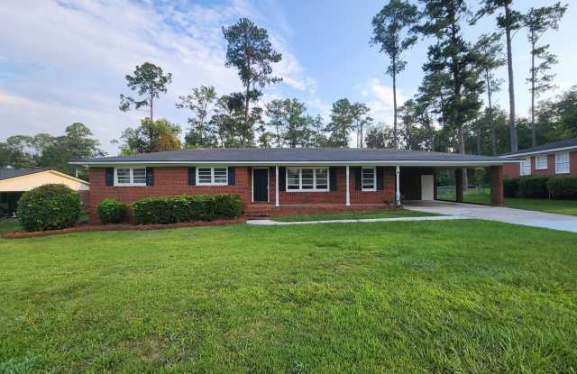 Spacious 3 Bedroom Brick Home with Open Floor Plan, Large Fenced Yard & Carport in Valdosta Gallery 1