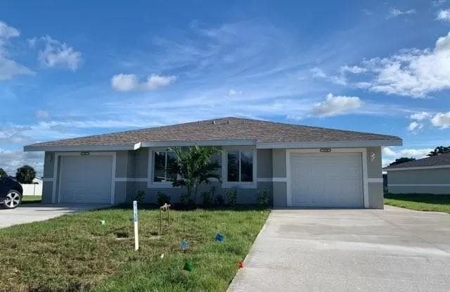 1180 Lake Mcgregor DR - 1180 Lake McGregor Dr, Cypress Lake, FL 33919