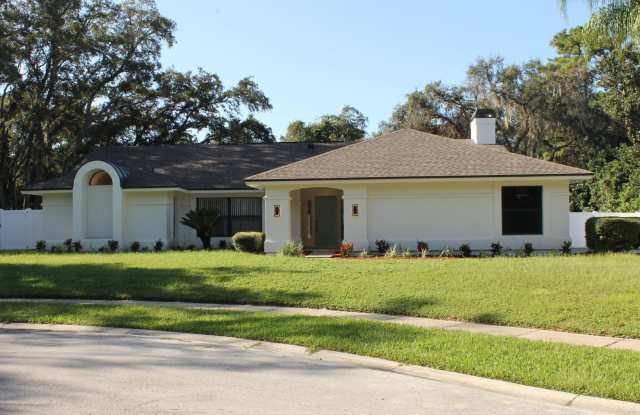 Enjoy this newly renovated, spacious 4-bedroom 2-bathroom home in the Tuscawilla Community of Winter Springs! photos photos