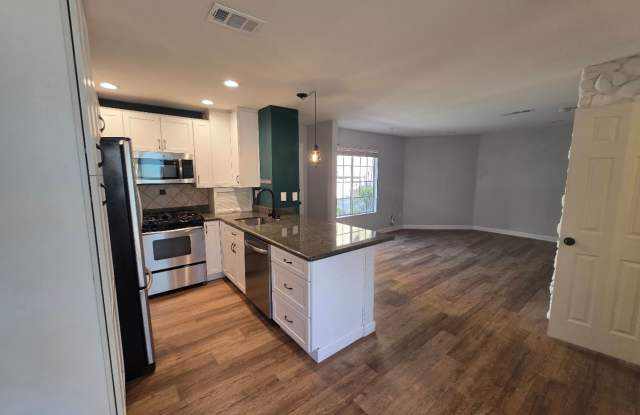 RENOVATED 2BD/1.5 BATH WITH PARKING, LAUNDRY, AND FULL H-VAC photos photos