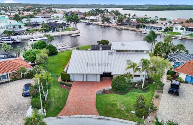 Experience exceptional waterfront living in this stunning 5-bed, 3-full-bath, 2-half-bath home boasting nearly 5,000sf of luxurious living space. photos photos
