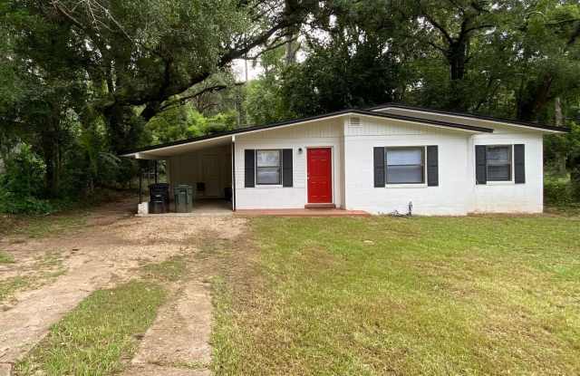 Charming home with a New Kitchen, tile floors throughout, Extra Family Rm. photos photos