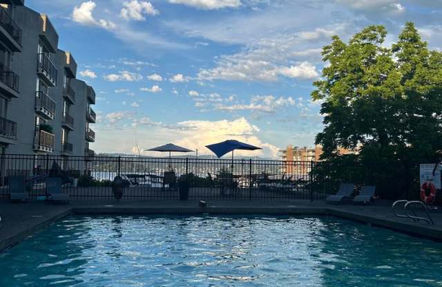 Updated 2-Bedroom Condo with Water Views, 2 Parking Spaces & Poolside Location Gallery 1