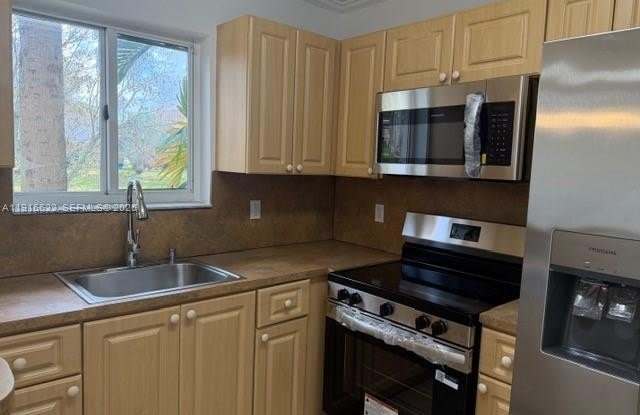 2199 NW 77th Way photos photos