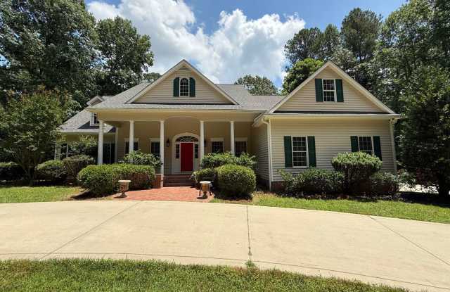 Tranquil and Secluded Raleigh Home with Unique Bonus Features Located on a 7+ Acre Lot on a Private Street with Plenty of Privacy and Outdoor Space photos photos