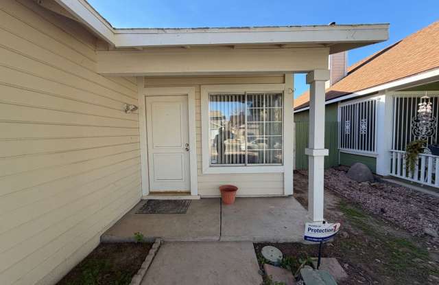 Welcome to this charming single-story home located in the Sunrise Manor! photos photos