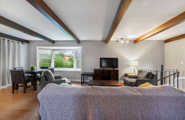 Home-Like Living with Sunroom, Attached Garage & In-Unit Laundry Gallery 4