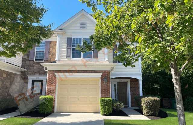 Welcome to this 3-bedroom, 2.5-bathroom, 1-car garage end-unit townhome in Davis Village, Cary, Available Now! Gallery 1