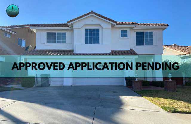 Step into luxury with this expansive 5 bedroom home! - 15659 Turnberry Street, Moreno Valley, CA 92555