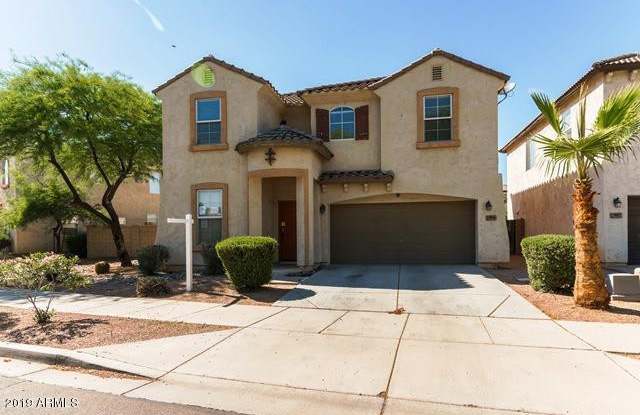 Gorgeous 4 Bed West Phoenix home opposite huge community park ++ New Carpet  New Paint!! - 9006 West Toronto Way, Phoenix, AZ 85353