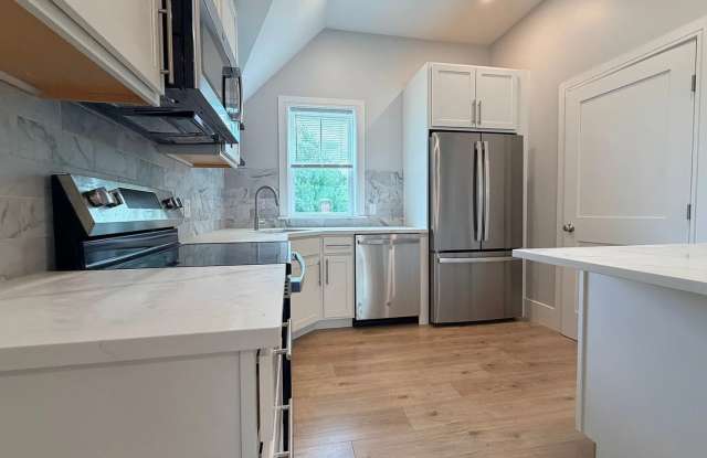 Brand New Construction in Perfect Location!  Laundry in Unit, Centralized Heating and A/C!  Pro Managed! photos photos