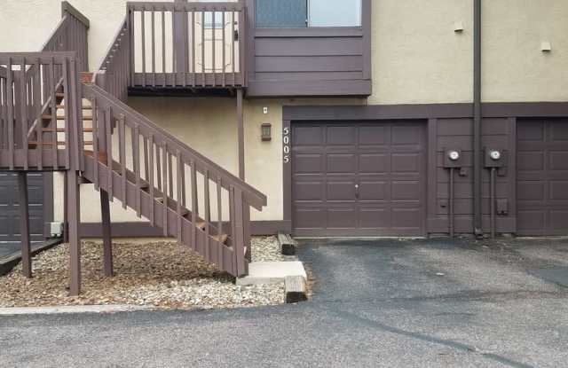1 Bedroom 1 Bath Townhome with Garage Parking in Village Seven photos photos