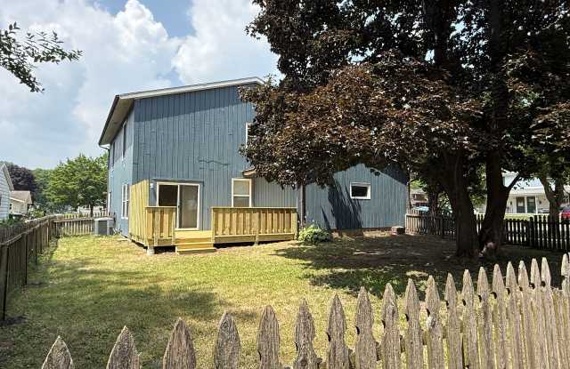 August 15th rent special! New deck! 3 Bedroom, updated kitchen, updated flooring, garage, driveway, and fenced yard - 9 month lease available! photos photos