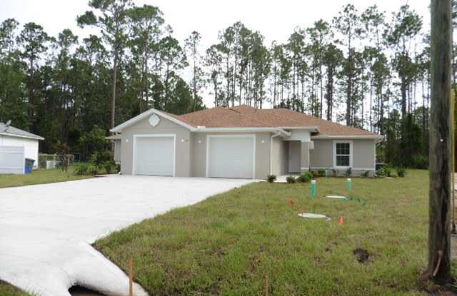 Roomy 3 Bed 2 Bath Home in Lehigh Woods w LAWN CUTTING Included! photos photos