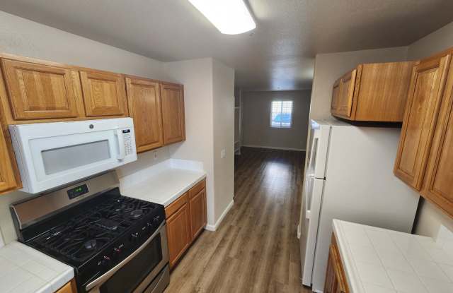 Downstairs 1 bedroom apartment with small patio and additional storage photos photos