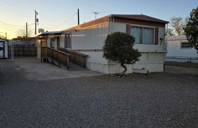 Benson single wide manufactured home with a yard - 221 County Road, Benson, AZ 85602