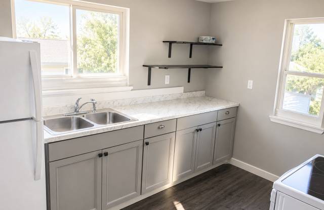 Charming 1 bed, 1 bath home featuring a fenced yard photos photos