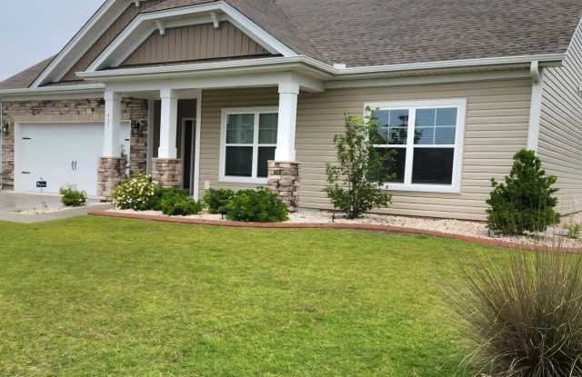 Discover your perfect retreat in this home, nestled in Conway’s Hillsborough community. photos photos