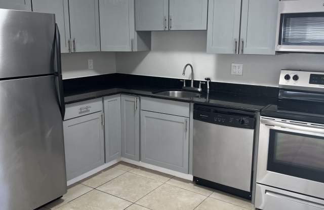 1114 NE 16TH PLACE - 3 photos photos