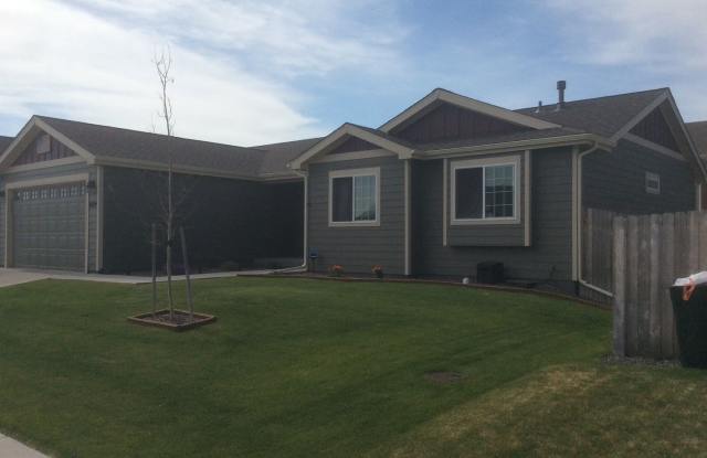 PET FRIENDLY 3 BEDROOM, 2 BATHROOM, SINGLE FAMILY HOME WITH 3 CAR ATTACHED GARAGE - 609 Grape Street, South Greeley, WY 82007