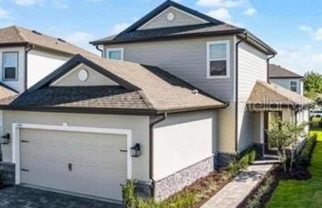 7745 SOMERSWORTH DRIVE - 7745 Somersworth Drive, Four Corners, FL 34747