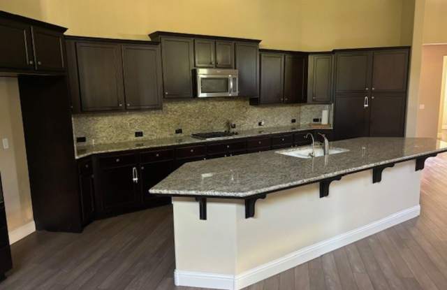 Move-In Ready: Elegant 4-Bedroom Home with Paid Solar in Gated Community photos photos