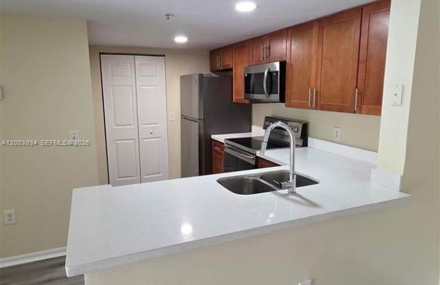 5051 Wiles Rd photos photos