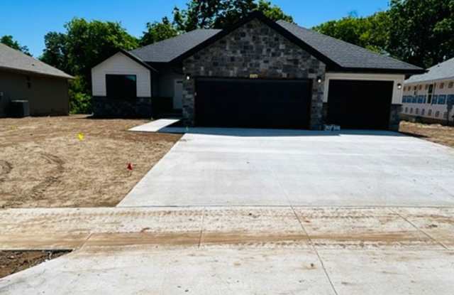 Beautiful, brand-new, 3-bedroom, 2-bath home in Nixa with a 3-car garage. photos photos