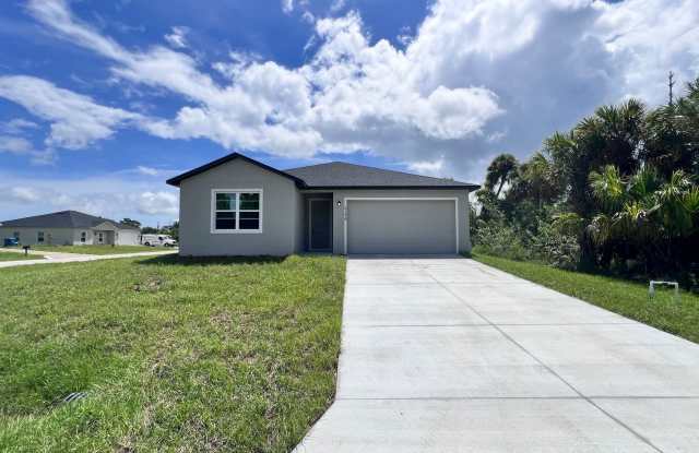 Spacious 3-Bedroom Home with Garage  Patio – Palm Bay, FL photos photos