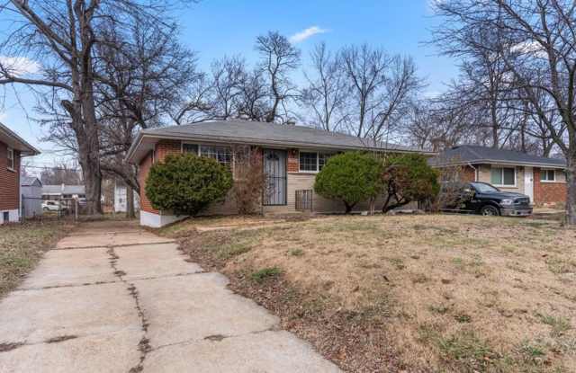 Freshly refreshed and move-in ready! - 1223 Reale Avenue, Spanish Lake, MO 63138