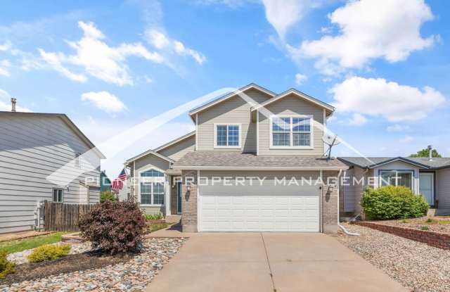 4 Bed, 3.5 Bath with 2 car garage, fully fenced yard, gas fireplace, AC and Modern Refinished Basement Gallery 1